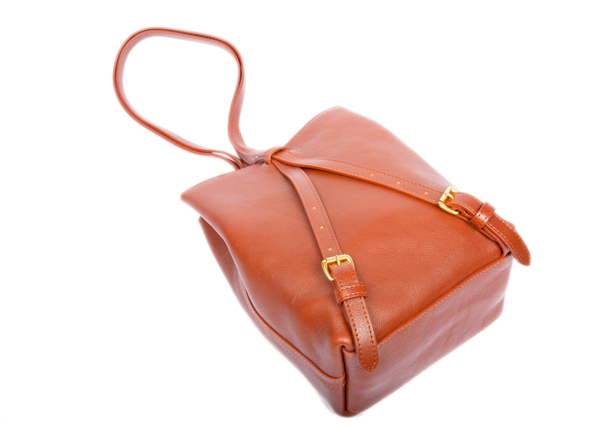 The Mini Sling Backpack Saddle Tan